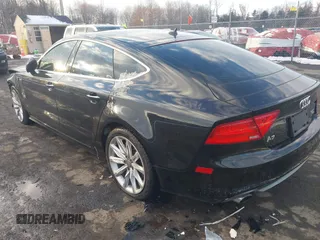 2013 Audi A7 Prestige with VIN WAU2GAFC1DN142732, listed as a IAAI auction lot 41396761 with 116,980 mi miles and . Bid and sale history available at DreamBid. Image 3.