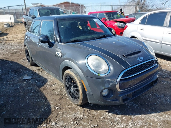 2015 MINI Hardtop 4 Door S with VIN WMWXU3C52F2B56517, listed as a IAAI auction lot 41437491 with 111,916 mi miles and . Bid and sale history available at DreamBid. Image 1.