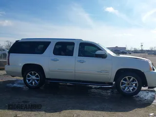 2010 GMC Yukon XL Denali with VIN 1GKUKMEF6AR157775, listed as a IAAI auction lot 41521509 with 201,836 mi miles. Bid and sale history available at carsss.com. Image 13.