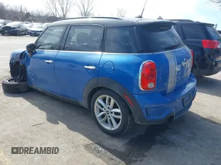 2014 MINI Countryman S with VIN WMWZC5C54EWM17299, listed as a IAAI auction lot 41655370 with 104,264 mi miles and . Bid and sale history available at DreamBid. Image 3.