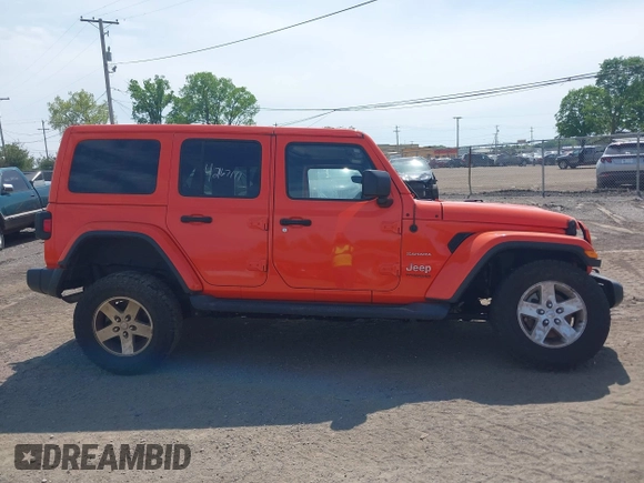2019 Jeep Wrangler Unlimited Sahara with VIN 1C4HJXEGXKW579982, listed as a IAAI auction lot 42167111 with 98,243 mi miles and . Bid and sale history available at DreamBid. Image 14.