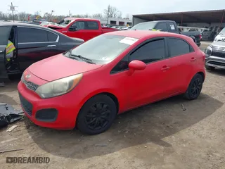2013 Kia Rio LX with VIN KNADM5A32D6126632, listed as a IAAI auction lot 42014867 with 156,098 mi miles. Bid and sale history available at carsss.com. Image 2.