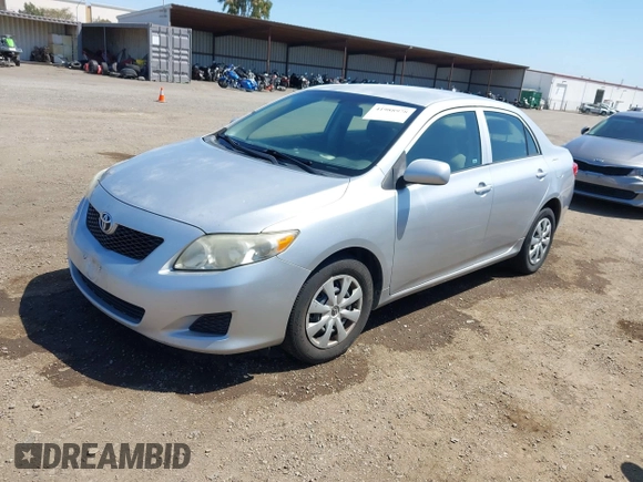2010 Toyota Corolla with VIN 1NXBU4EE1AZ319230, listed as a IAAI auction lot 41988978 with 238,497 mi miles. Bid and sale history available at carsss.com. Image 2.