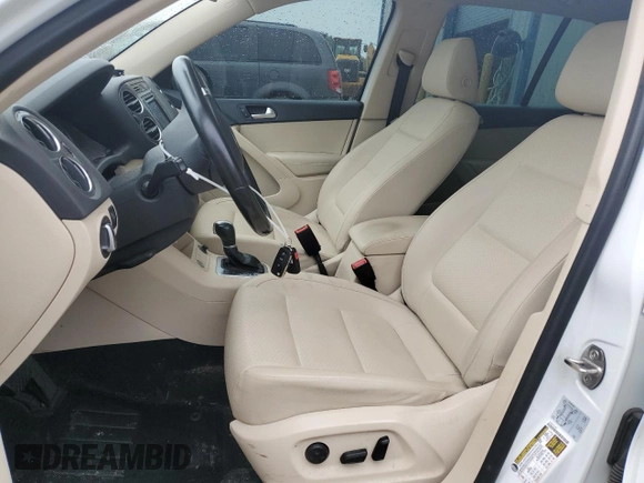 2017 Volkswagen Tiguan Wolfsburg Edition with VIN WVGSV7AX9HW512214, listed as a Copart auction lot 60062865 with 62,667 mi miles and Salvage title. Bid and sale history available at DreamBid. Image 7.