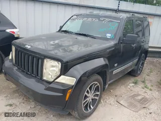 2011 Jeep Liberty Sport with VIN 1J4PP2GK0BW559054, listed as a IAAI auction lot 41642092 with 273,927 mi miles. Bid and sale history available at carsss.com. Image 2.