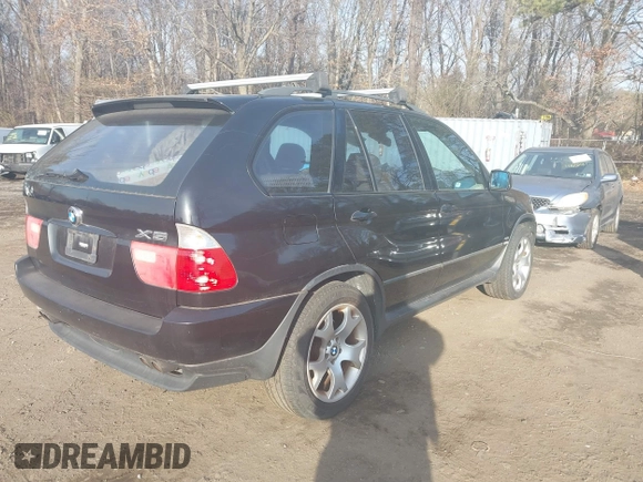 2003 BMW X5 4.4i with VIN 5UXFB33543LH43200, listed as a IAAI auction lot 41652303 with 169,250 mi miles. Bid and sale history available at carsss.com. Image 4.