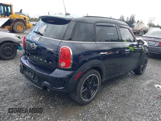 2015 MINI Countryman S z VIN WMWZC3C57FWT06297, wystawiony jako IAAI lot #41988157 z przebiegiem 74 461 mil mil oraz . Historia ofert i sprzedaży dostępna na DreamBid. Obrazek 4.
