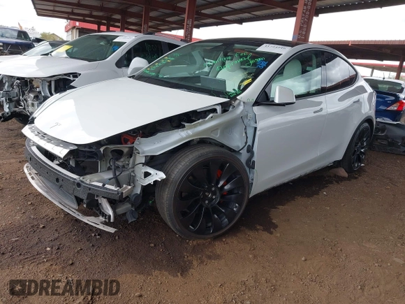 2022 Tesla Model Y Performance with VIN 7SAYGDEF4NF449986, listed as a IAAI auction lot 41754916 with 64,384 mi miles and . Bid and sale history available at DreamBid. Image 2.
