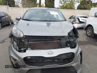 2020 Kia Sportage LX with VIN KNDPM3AC5L7759283, listed as a IAAI auction lot 41901056 with 71,123 mi miles and . Bid and sale history available at carsss.com. Image 13.