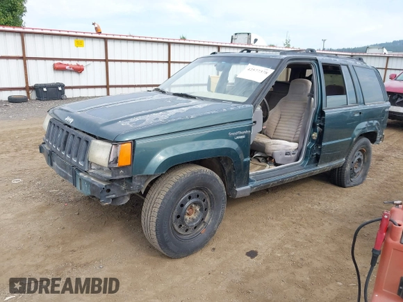 1994 Jeep Grand Cherokee Laredo with VIN 1J4GZ58S9RC215874, listed as a IAAI auction lot 42577378 with 230,824 mi miles and . Bid and sale history available at DreamBid. Image 2.