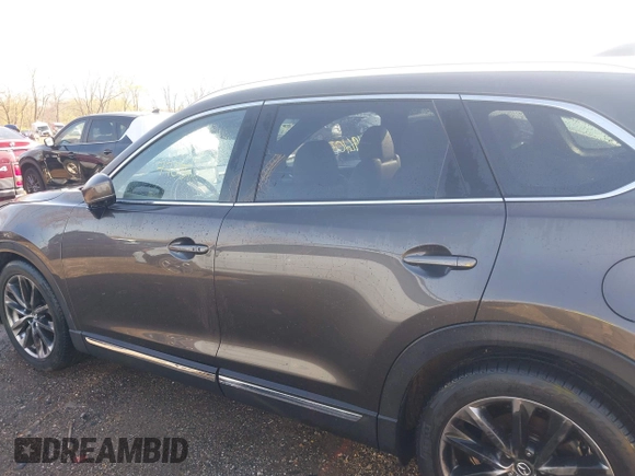 2016 Mazda CX-9 Grand Touring z VIN JM3TCBDY3G0104001, wystawiony jako IAAI lot #41961054 z przebiegiem 77 057 mil mil oraz . Historia ofert i sprzedaży dostępna na DreamBid. Obrazek 14.
