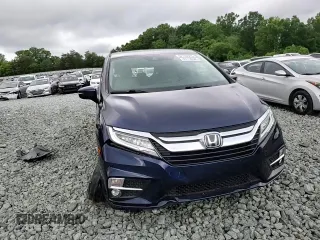 2018 Honda Odyssey Elite z VIN 5FNRL6H9XJB039802, wystawiony jako Copart lot #57116345 z przebiegiem 107 939 mil mil oraz Szkoda całkowita • Salvage title. Historia ofert i sprzedaży dostępna na DreamBid. Obrazek 14.