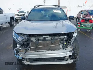 2021 Toyota RAV4 Hybrid XSE with VIN 4T3E6RFV1MU057532, listed as a IAAI auction lot 41713474 with 22,164 mi miles. Bid and sale history available at carsss.com. Image 13.