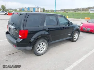 2008 Mazda Tribute Grand Touring with VIN 4F2CZ02Z48KM26109, listed as a IAAI auction lot 42011447 with 221,686 mi miles. Bid and sale history available at carsss.com. Image 4.