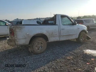 2000 Ford F-150 XL with VIN 1FTZF1727YKB49797, listed as a Copart auction lot 62154595 with Not provided miles and Salvage title. Bid and sale history available at DreamBid. Image 3.