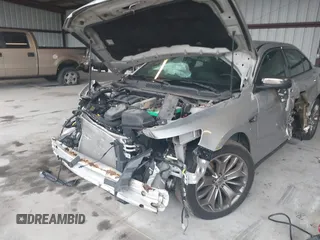 2014 Ford Taurus Limited с VIN 1FAHP2F89EG186147, выставлен на аукционе IAAI как лот 42228000 с пробегом 179 863 миль миль и . История ставок и продаж доступна на DreamBid. Изображение 6.
