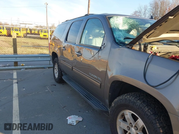 2014 GMC Yukon XL SLT with VIN 1GKS1KE06ER127515, listed as a IAAI auction lot 40990479 with 236,725 mi miles. Bid and sale history available at carsss.com. Image 6.