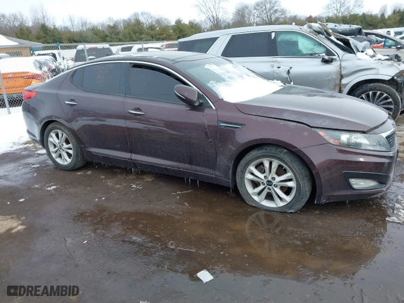 2011 Kia Optima EX with VIN KNAGN4A75B5158176, listed as a IAAI auction lot 41553536 with 140,785 mi miles. Bid and sale history available at carsss.com. Image 12.