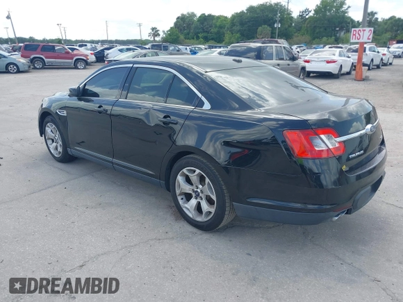 2012 Ford Taurus SEL with VIN 1FAHP2EW8CG113879, listed as a IAAI auction lot 42004495 with 194,952 mi miles and . Bid and sale history available at DreamBid. Image 3.