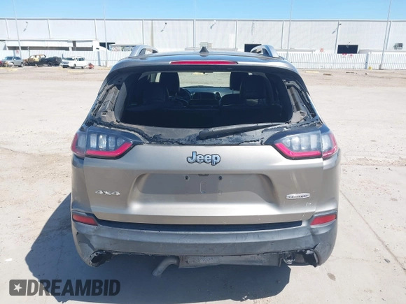 2019 Jeep Cherokee Latitude Plus with VIN 1C4PJMLBXKD233749, listed as a IAAI auction lot 41937698 with 103,988 mi miles and . Bid and sale history available at DreamBid. Image 17.