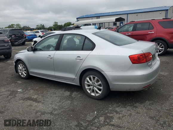 2011 Volkswagen Jetta SE with VIN 3VWDZ7AJ9BM320146, listed as a Copart auction lot 58521605 with 164,045 mi miles and Salvage title. Bid and sale history available at DreamBid. Image 2.