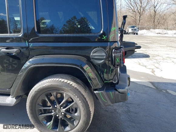 2023 Jeep Wrangler 4xe Sahara with VIN 1C4JJXP62PW613040, listed as a IAAI auction lot 41489171 with 36,818 mi miles. Bid and sale history available at carsss.com. Image 21.