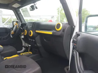 2015 Jeep Wrangler Unlimited Sahara с VIN 1C4BJWEG1FL506393, выставлен на аукционе IAAI как лот 42326900 с пробегом 100 538 миль миль и . История ставок и продаж доступна на DreamBid. Изображение 5.