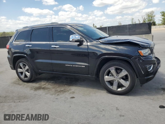 2014 Jeep Grand Cherokee Overland with VIN 1C4RJECG9EC173693, listed as a Copart auction lot 53747045 with 73,234 mi miles and Non Repairable. Bid and sale history available at carsss.com. Image 4.