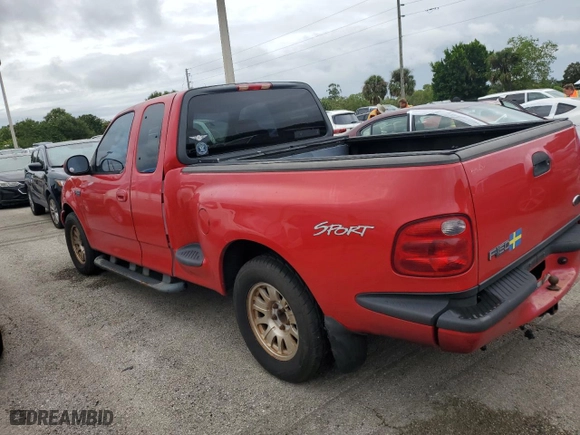 2003 Ford F-150 XL with VIN 1FTRX07243KB72082, listed as a Copart auction lot 74593004 with 0 mi miles and Salvage Title. Bid and sale history available at carsss.com. Image 2.