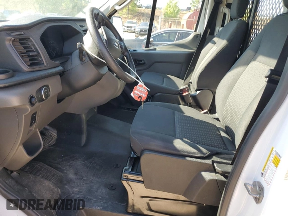 2024 Ford Transit Cargo with VIN 1FTBR1Y85RKA71078, listed as a Copart auction lot 53077775 with 6,991 mi miles and Clean Title. Bid and sale history available at DreamBid. Image 7.