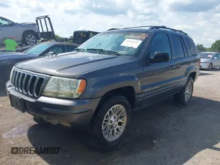 2002 Jeep Grand Cherokee Limited with VIN 1J4GW58J02C163931, listed as a IAAI auction lot 42632552 with 228,955 mi miles and . Bid and sale history available at DreamBid. Image 2.