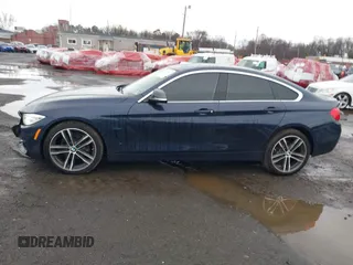 2016 BMW 4 Series 428i xDrive with VIN WBA4C9C59GG137067, listed as a IAAI auction lot 41913733 with 104,378 mi miles and . Bid and sale history available at carsss.com. Image 14.