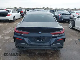 2021 BMW 8 Series M850i with VIN WBAGV8C03MCG68700, listed as a IAAI auction lot 41684696 with 18,516 mi miles. Bid and sale history available at carsss.com. Image 16.