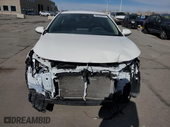 2023 Toyota Corolla Hybrid LE with VIN JTDBCMFE6PJ004987, listed as a Copart auction lot 48596975 with 33,122 mi miles and Salvage Title. Bid and sale history available at carsss.com. Image 5.