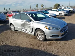 2014 Ford Fusion SE Hybrid with VIN 3FA6P0LU4ER206343, listed as a IAAI auction lot 41600260 with 198,834 mi miles and . Bid and sale history available at DreamBid. Image 1.