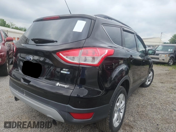 2013 Ford Escape SE with VIN 1FMCU9GX1DUB62190, listed as a Copart auction lot 65360805 with 134,955 mi miles and Clean title. Bid and sale history available at DreamBid. Image 4.