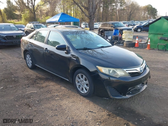 2014 Toyota Camry Hybrid LE with VIN 4T1BD1FK8EU113508, listed as a IAAI auction lot 42068470 with 386,932 mi miles. Bid and sale history available at carsss.com. Image 1.