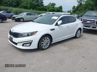 2015 Kia Optima EX with VIN 5XXGN4A77FG452747, listed as a IAAI auction lot 42772766 with 97,243 mi miles and . Bid and sale history available at DreamBid. Image 2.