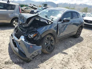 2021 Mazda CX-30 Premium Plus z VIN 3MVDMBEY2MM255542, wystawiony jako Copart lot #57804255 z przebiegiem 45 322 mil mil oraz Szkoda całkowita • Salvage title. Historia ofert i sprzedaży dostępna na DreamBid. Obrazek 1.