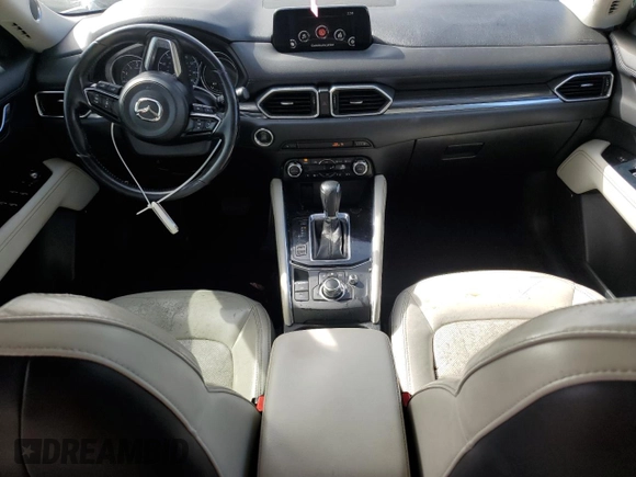 2018 Mazda CX-5 Grand Touring with VIN JM3KFADM5J1350107, listed as a Copart auction lot 50332375 with 110,319 mi miles and Salvage Title. Bid and sale history available at DreamBid. Image 8.