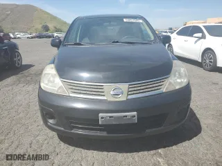 2009 Nissan Versa 1.8 SL with VIN 3N1BC13E09L421670, listed as a Copart auction lot 54051045 with 141,494 mi miles and Salvage Title. Bid and sale history available at carsss.com. Image 5.