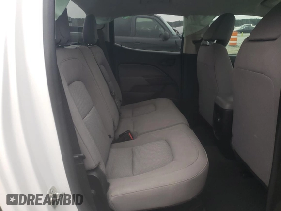2019 Chevrolet Colorado 2WD Work Truck z VIN 1GCGSBEN3K1225745, wystawiony jako Copart lot #87800275 z przebiegiem 38 689 mil mil oraz Szkoda całkowita • Salvage title. Historia ofert i sprzedaży dostępna na DreamBid. Obrazek 10.