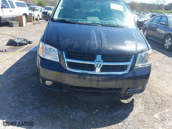 2010 Dodge Grand Caravan SXT with VIN 2D4RN5D18AR233143, listed as a IAAI auction lot 41880502 with 145,356 mi miles. Bid and sale history available at carsss.com. Image 6.