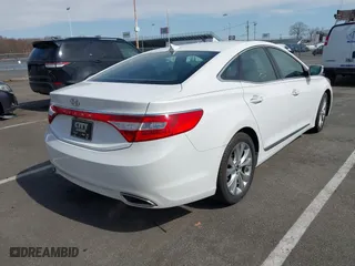 2013 Hyundai Azera with VIN KMHFG4JG7DA247682, listed as a IAAI auction lot 41843611 with 63,009 mi miles. Bid and sale history available at carsss.com. Image 4.