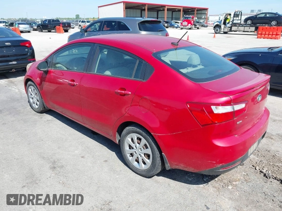 2014 Kia Rio LX with VIN KNADM4A32E6334330, listed as a IAAI auction lot 42239542 with 134,314 mi miles and . Bid and sale history available at DreamBid. Image 3.