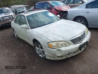 2001 Mazda Millenia with VIN JM1TA221211708077, listed as a IAAI auction lot 41517393 with 269,771 mi miles and . Bid and sale history available at DreamBid. Image 1.