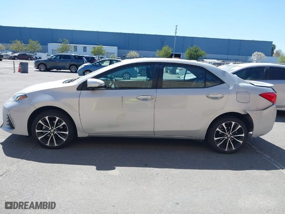 2019 Toyota Corolla L with VIN 5YFBURHE8KP882089, listed as a IAAI auction lot 39545437 with 117,129 mi miles. Bid and sale history available at carsss.com. Image 14.