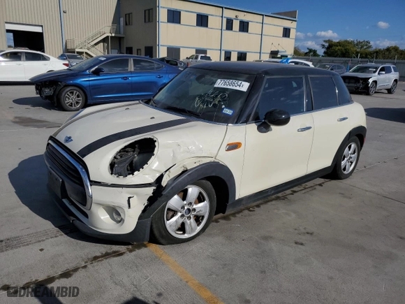 2016 MINI Cooper Hardtop 4 Door with VIN WMWXU1C57G2D13058, listed as a Copart auction lot 77658654 with 108,363 mi miles and Salvage Title. Bid and sale history available at carsss.com. Image 1.