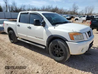 2011 Nissan Titan SL with VIN 1N6BA0EC8BN321974, listed as a Copart auction lot 43952785 with 145,137 mi miles and Salvage Title. Bid and sale history available at carsss.com. Image 4.