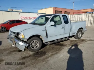 2000 Ford F-150 XL with VIN 1FTZX0723YKA02769, listed as a Copart auction lot 78722714 with 354,312 mi miles and Salvage title. Bid and sale history available at DreamBid. Image 1.